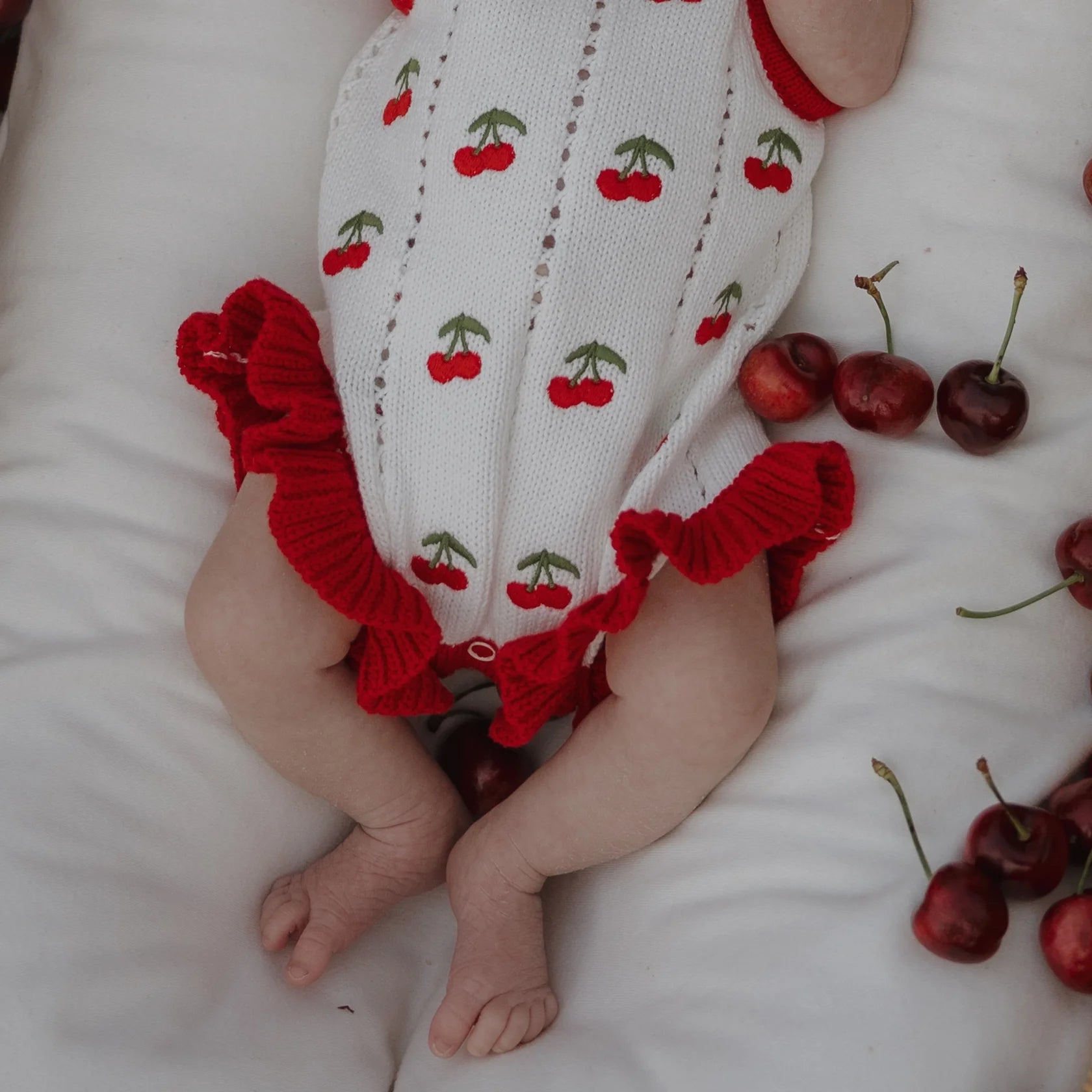 FOREVER FRENCH: Cherry Knit Ruffle Romper
