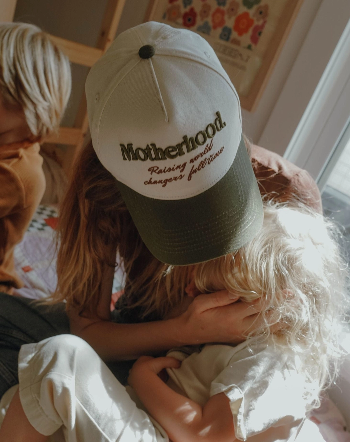"Motherhood: Raising World Changer" Trucker Hat